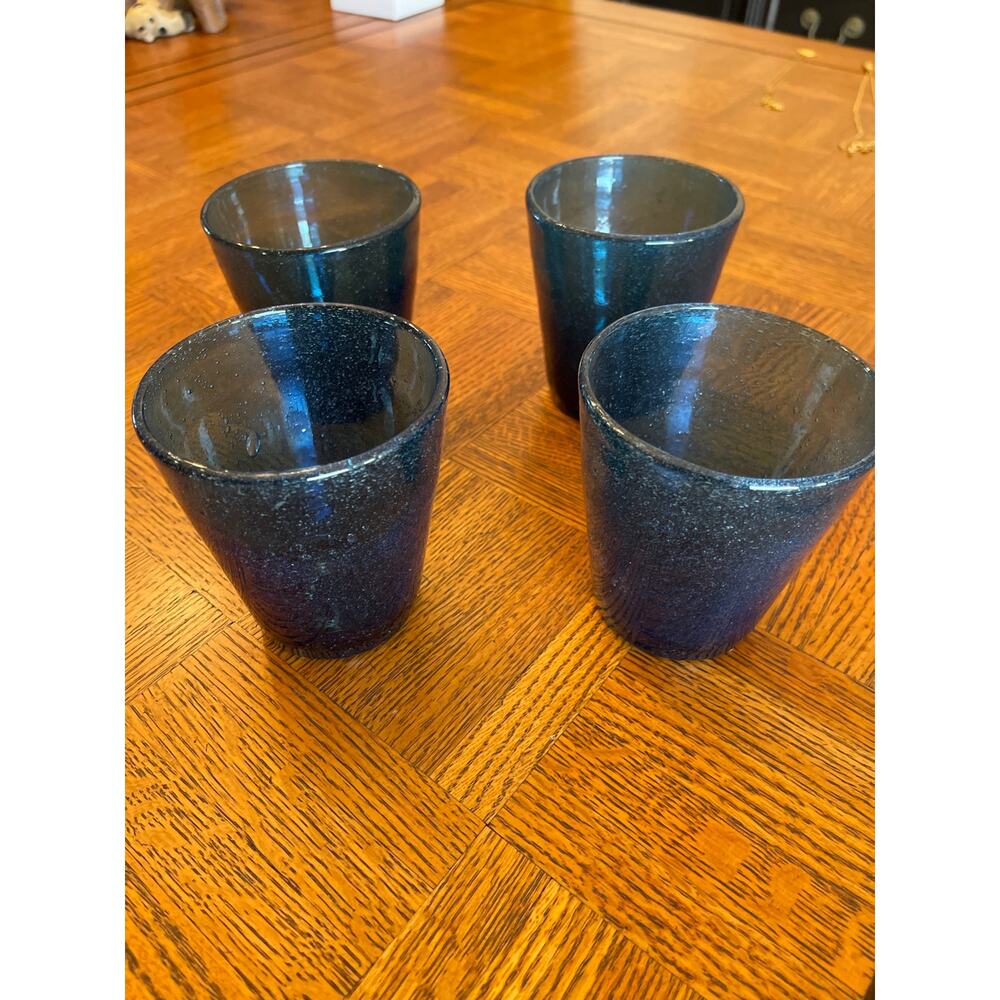 Set up four Neiman Marcus glass tumblers blue